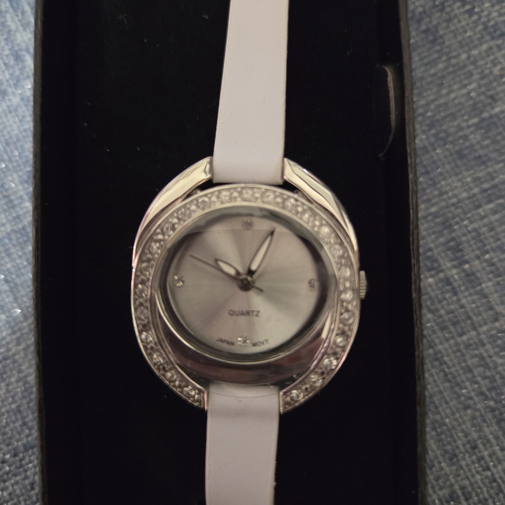 White and Silver Quartz Watch